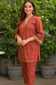 Rust Paisley Printed Kurta Set with Gold Lace Detailing